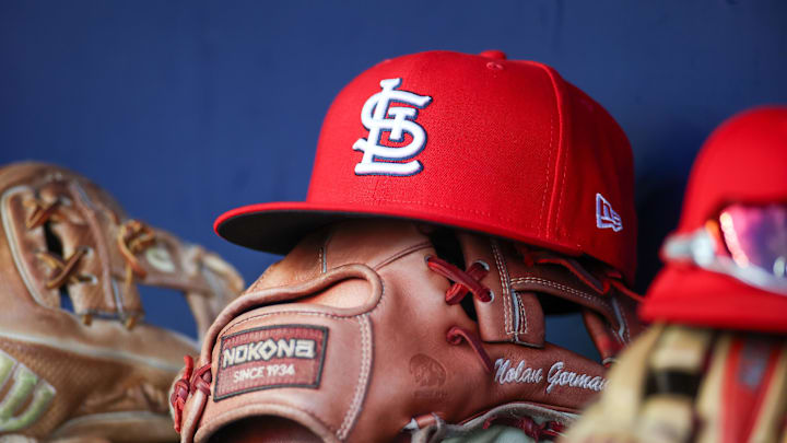 Sep 5, 2023; Atlanta, Georgia, USA; A detailed view of the hat and glove of St. Louis Cardinals second baseman Nolan Gorman (not pictured) before a game against the Atlanta Braves at Truist Park. Mandatory Credit: Brett Davis-Imagn Images