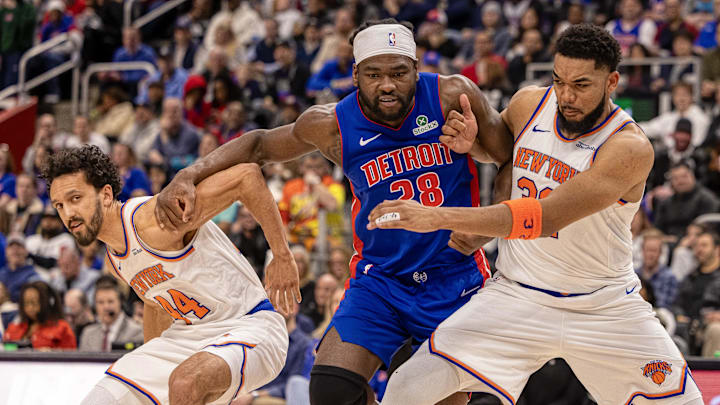 Apr 10, 2025; Detroit, Michigan, USA; Detroit Pistons center Isaiah Stewart (28) battles for position New York Knicks forward Precious Achiuwa (5) and guard Landry Shamet (44) during the second half at Little Caesars Arena. Mandatory Credit: David Reginek-Imagn Images