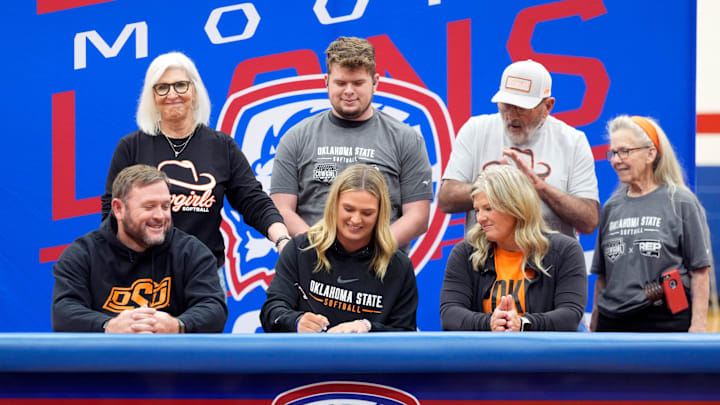 Moore's Libby Jacques signs with Oklahoma State softball during signing day at Moore High School in Moore, Okla., Wednesday, Nov. 13, 2024.