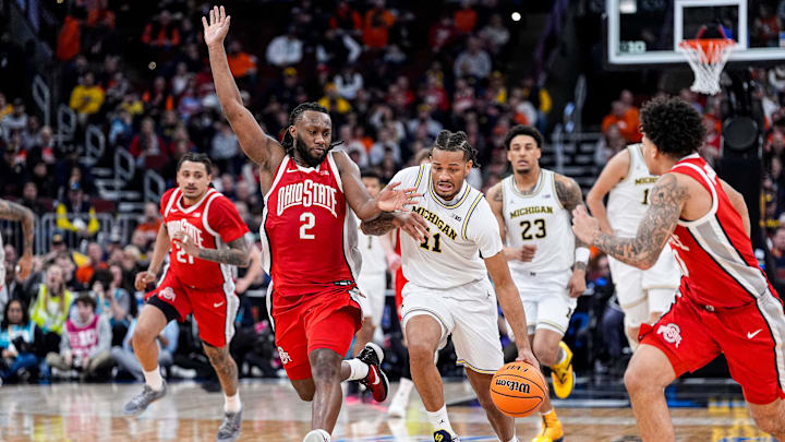 Michigan guard Roddy Gayle Jr. (11) dribbles against Ohio State guard Bruce Thornton (2) during the second half of Big Ten tournament quarterfinal at United Center in Chicago on Friday, March 13, 2026.