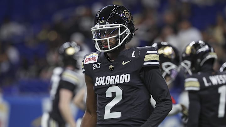 Dec 28, 2024; San Antonio, TX, USA; Colorado Buffaloes quarterback Shedeur Sanders (2) warms up before the game against the Brigham Young Cougars at Alamodome. Mandatory Credit: Troy Taormina-Imagn Images