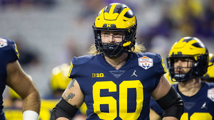 Dec 31, 2022; Glendale, Arizona, USA; Michigan Wolverines offensive lineman Connor Jones (60) against the TCU Horned Frogs during the 2022 Fiesta Bowl at State Farm Stadium. Dec 31, 2022; Glendale, Arizona, USA; Michigan Wolverines offensive lineman Connor Jones (60) against the TCU Horned Frogs during the 2022 Fiesta Bowl at State Farm Stadium.