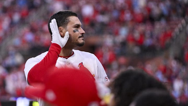 Mar 27, 2025; St. Louis, Missouri, USA; St. Louis Cardinals third baseman Nolan Arenado (28) reacts as he receives a curtain call after hitting a solo home run against the Minnesota Twins during the eighth inning at Busch Stadium. Mandatory Credit: Jeff Curry-Imagn Images Mar 27, 2025; St. Louis, Missouri, USA; St. Louis Cardinals third baseman Nolan Arenado (28) reacts as he receives a curtain call after hitting a solo home run against the Minnesota Twins during the eighth inning at Busch Stadium. Mandatory Credit: Jeff Curry-Imagn Images