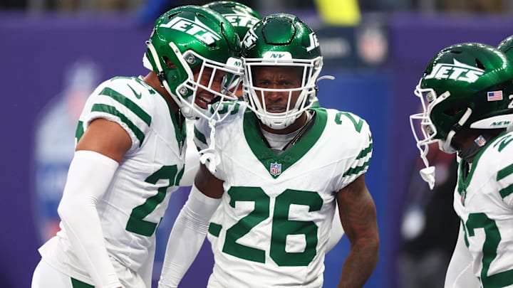 Oct 6, 2024; Tottenham, ENG; New York Jets efensive back Brandin Echols (26) celebrates an interception in the 4th Quarter against New York Jets at Tottenham Hotspur Stadium. Mandatory Credit: Shaun Brooks-Imagn Images