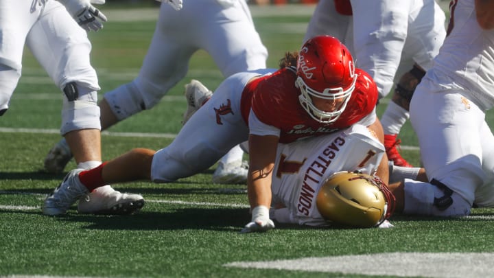 Louisville's Ashton Gillotte sacks Boston College's Thomas Castellanos Saturday afternoon in L&N Stadium.