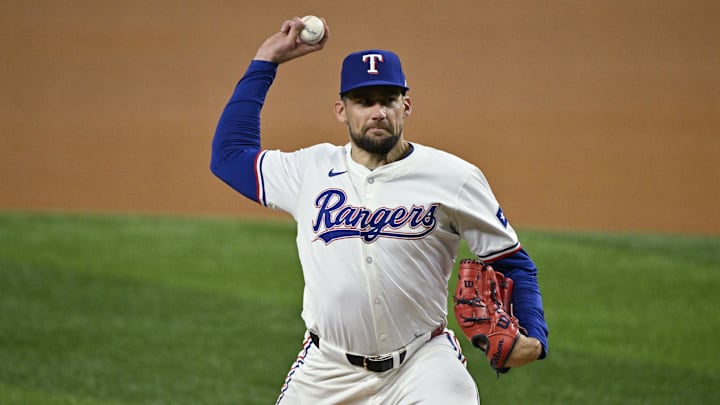 Sep 17, 2024; Arlington, Texas, USA; Texas Rangers starting pitcher Nathan Eovaldi (17) pitches against the Toronto Blue Jays during the first inning at Globe Life Field. Mandatory Credit: Jerome Miron-Imagn Images