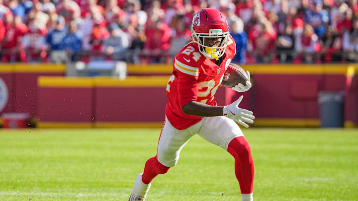 Nov 23, 2025; Kansas City, Missouri, USA; Kansas City Chiefs running back Brashard Smith (24) runs the ball against the Indianapolis Colts during the game at GEHA Field at Arrowhead Stadium. 