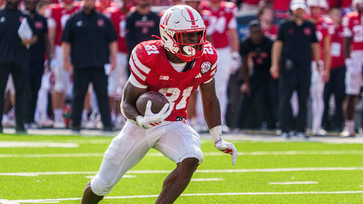 Nebraska running back Emmett Johnson gained 67 yards on 19 carries against Michigan. Nebraska running back Emmett Johnson gained 67 yards on 19 carries against Michigan.