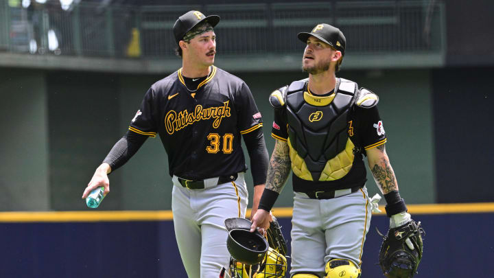 Jul 11, 2024; Milwaukee, Wisconsin, USA;  Pittsburgh Pirates pitcher Paul Skenes (30) walks in with catcher Yasmani Grandal (6) before game against the Milwaukee Brewers at American Family Field. Mandatory Credit: Benny Sieu-USA TODAY Sports