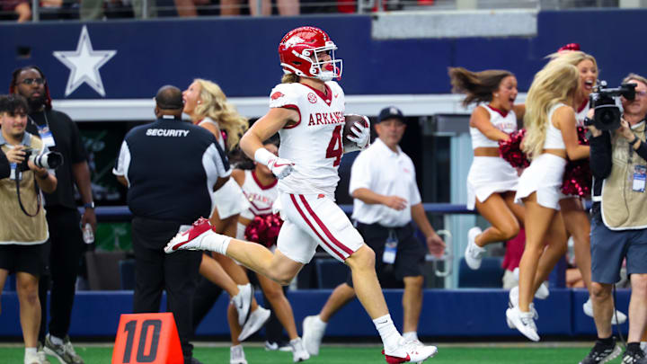 Arkansas Razorbacks wide receiver Isaac TeSlaa (4) catches a pass and scores a touchdown against Texas A&M