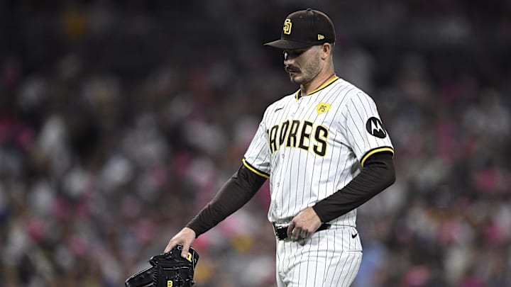 Aug 22, 2024; San Diego, California, USA; San Diego Padres starting pitcher Dylan Cease (84) walks to the dugout after a pitching change in the seventh inning against the New York Mets at Petco Park. Mandatory Credit: Orlando Ramirez-Imagn Images