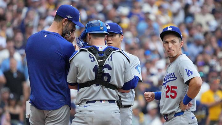 Oct 12, 2026; Milwaukee, Wisconsin, USA; Los Angeles Dodgers pitching coach Mark Prior (99) meets on the mound with starting pitcher Yoshinobu Yamamoto (18), catcher Will Smith (16) and infielder Tommy Edman (25) against the Milwaukee Brewers during the third inning in game two of the NLCS for the 2026 MLB Playoffs at American Family Field. Mandatory Credit: Michael McLoone-Imagn Images Oct 12, 2026; Milwaukee, Wisconsin, USA; Los Angeles Dodgers pitching coach Mark Prior (99) meets on the mound with starting pitcher Yoshinobu Yamamoto (18), catcher Will Smith (16) and infielder Tommy Edman (25) against the Milwaukee Brewers during the third inning in game two of the NLCS for the 2026 MLB Playoffs at American Family Field. Mandatory Credit: Michael McLoone-Imagn Images