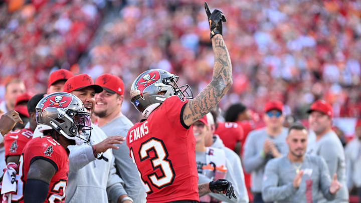 Jan 5, 2025; Tampa, Florida, USA; Tampa Bay Buccaneers wide receiver Mike Evans (13) celebrates after a reception to put him over 1,000 yards for the season in the second half against the New Orleans Saints at Raymond James Stadium. Mandatory Credit: Jonathan Dyer-Imagn Images Jan 5, 2025; Tampa, Florida, USA; Tampa Bay Buccaneers wide receiver Mike Evans (13) celebrates after a reception to put him over 1,000 yards for the season in the second half against the New Orleans Saints at Raymond James Stadium. Mandatory Credit: Jonathan Dyer-Imagn Images