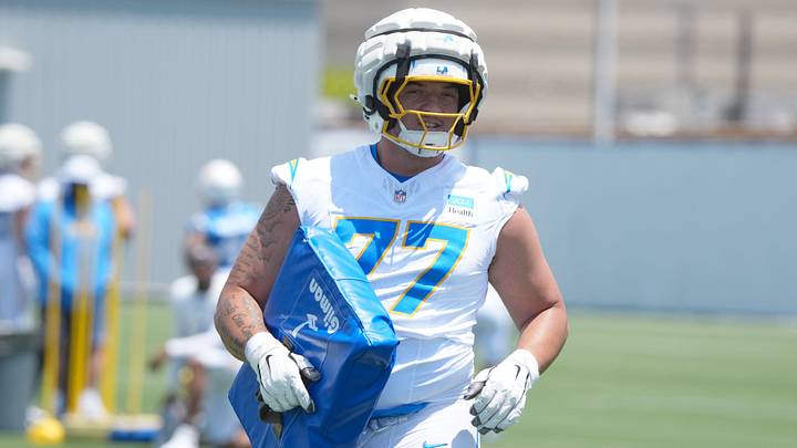 Jun 17, 2026; El Segundo, CA, USA; Los Angeles Chargers tackle Travis Burke (77) during minicamp at The Bolt. Mandatory Credit: Kirby Lee-Imagn Images