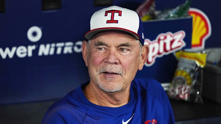 Aug 16, 2025; Toronto, Ontario, CAN; Texas Rangers manager Bruce Bochy (15) talks with the media in the dugout during batting practice before a game against the Toronto Blue Jays Credit: Nick Turchiaro-Imagn Images Aug 16, 2025; Toronto, Ontario, CAN; Texas Rangers manager Bruce Bochy (15) talks with the media in the dugout during batting practice before a game against the Toronto Blue Jays Credit: Nick Turchiaro-Imagn Images