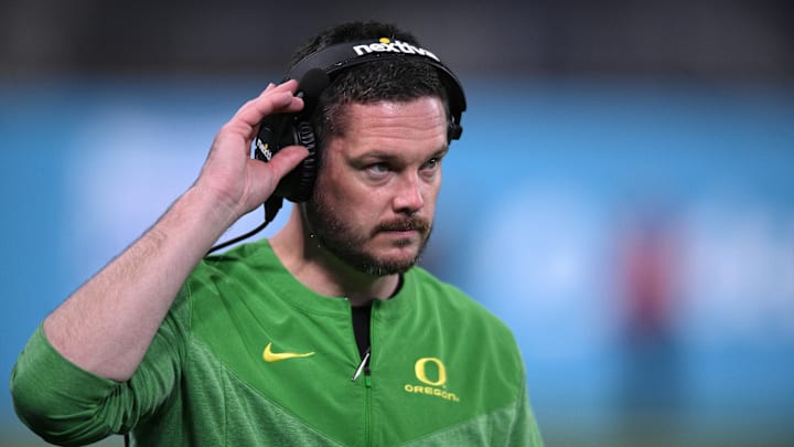 Dec 28, 2022; San Diego, CA, USA; Oregon Ducks head coach Dan Lanning looks on from the sideline during the second half against the North Carolina Tar Heels of the 2022 Holiday Bowl at Petco Park. Mandatory Credit: Orlando Ramirez-Imagn Images Dec 28, 2022; San Diego, CA, USA; Oregon Ducks head coach Dan Lanning looks on from the sideline during the second half against the North Carolina Tar Heels of the 2022 Holiday Bowl at Petco Park. Mandatory Credit: Orlando Ramirez-Imagn Images