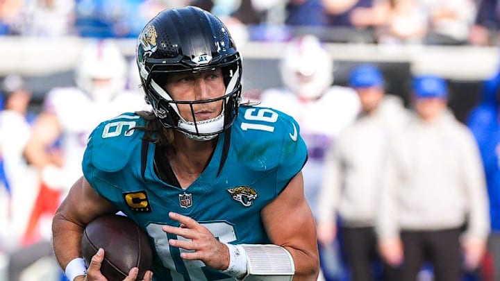 Jacksonville Jaguars quarterback Trevor Lawrence (16) runs during the fourth quarter in an NFL football AFC Wild Card playoff matchup, Sunday, Jan. 11, 2026, in Jacksonville, Fla. Bills lead 10-7 at the half over the Jaguars. The Bills defeated the Jaguars 27-24. [Doug Engle/Florida Times-Union]