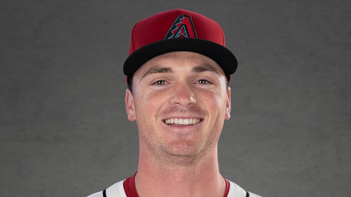 Feb 19, 2025; Scottsdale, AZ, USA; Arizona Diamondbacks pitcher Tommy Henry (47) poses for a portrait for MLB Media Day at Salt River Fields.  Mandatory Credit: Allan Henry-Imagn Images