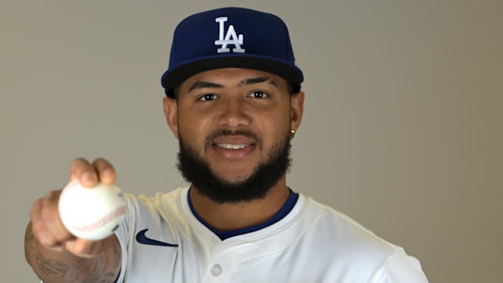 Feb 18, 2025; Glendale, AZ, USA; Los Angeles Dodgers pitcher Carlos Duran (83) poses for a photo during media day at Camelback Ranch. Mandatory Credit: Jayne Kamin-Oncea-Imagn Images