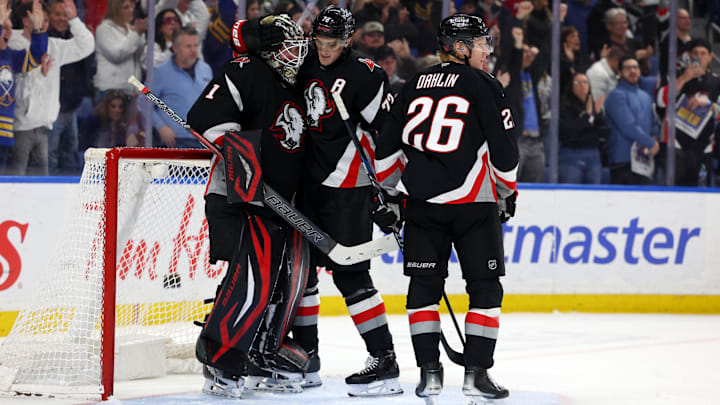 Buffalo Sabres players Ukko-Pekka Luukkonen, Tage Thompson and Rasmus Dahlin