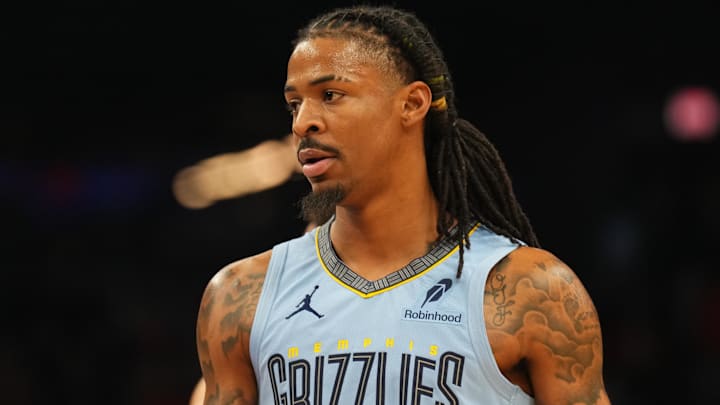 Feb 11, 2025; Phoenix, Arizona, USA; Memphis Grizzlies guard Ja Morant (12) looks on against the Phoenix Suns during the first half at Footprint Center. Mandatory Credit: Joe Camporeale-Imagn Images