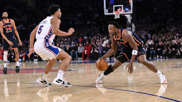 Apr 1, 2025; New York, New York, USA; New York Knicks forward OG Anunoby (8) makes a move against Philadelphia 76ers guard Quentin Grimes (5) during the first half at Madison Square Garden. Mandatory Credit: John Jones-Imagn Images