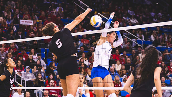 Rebekah Allick slams an overpass for a kill against UCLA. The senior middle blocker finished with 13 kills and seven blocks against the Bruins.
