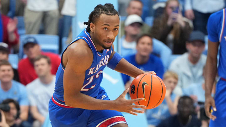 Nov 7, 2025; Chapel Hill, North Carolina, USA;  Kansas Jayhawks guard Darryn Peterson (22) on the fast break in the first half at Dean E. Smith Center. Mandatory Credit: Bob Donnan-Imagn Images