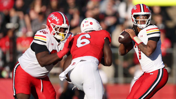 Nov 8, 2025; Piscataway, New Jersey, USA; Maryland Terrapins quarterback Malik Washington (7) drops back to pass while Aliou Bah (66) blocks against the Rutgers Scarlet Knights at SHI Stadium.
