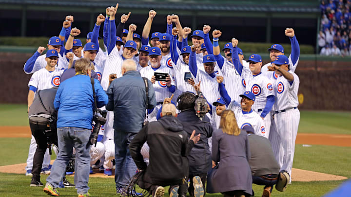 Apr 12, 2017; Chicago, IL, USA; iThe Chicago Cubs celebrate receiving their 2016 World Series championship rings before the game against the Los Angeles Dodgers at Wrigley Field. Apr 12, 2017; Chicago, IL, USA; iThe Chicago Cubs celebrate receiving their 2016 World Series championship rings before the game against the Los Angeles Dodgers at Wrigley Field.