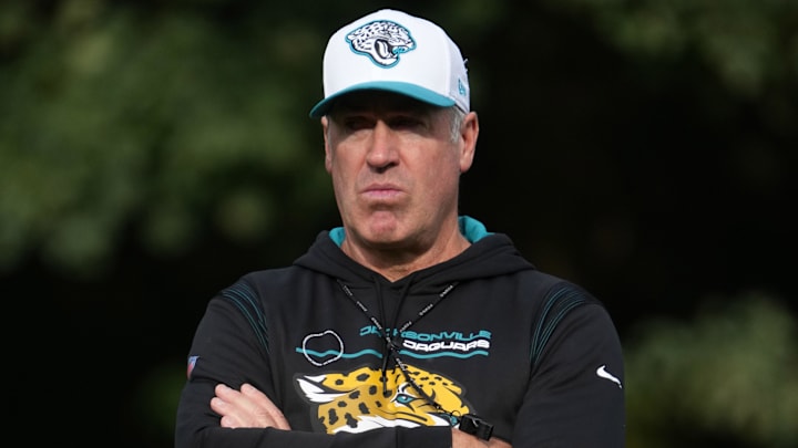 Oct 17, 2024; Watford, United Kingdom; Jacksonville Jaguars coach Doug Pederson watches during practice at The Grove. Mandatory Credit: Kirby Lee-Imagn Images
