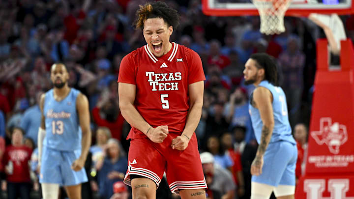 Feb 1, 2025; Houston, Texas, USA; Texas Tech Red Raiders forward Darrion Williams (5) reacts after shooting a three point basket to tie the game with seconds left on the clock against the Houston Cougars at Fertitta Center. Mandatory Credit: Maria Lysaker-Imagn Images 