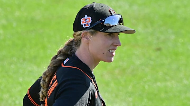 Feb 16, 2023; Scottsdale, AZ, USA; San Francisco Giants major league assistant coach Alyssa Nakken (92) looks on during a Spring Training workout at Scottsdale Stadium. 