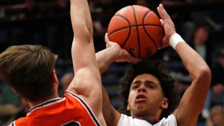 Harrison Raiders Alex Mithoefer (23) defends the shot of Lafayette Jeff Bronchos Devion Penny (11) during the IHSAA boy’s basketball sectional game, Tuesday, Feb. 28, 2023, at Memorial Gymnasium in Kokomo, Ind. Harrison won 54-39. Harrison Raiders Alex Mithoefer (23) defends the shot of Lafayette Jeff Bronchos Devion Penny (11) during the IHSAA boy’s basketball sectional game, Tuesday, Feb. 28, 2023, at Memorial Gymnasium in Kokomo, Ind. Harrison won 54-39.
