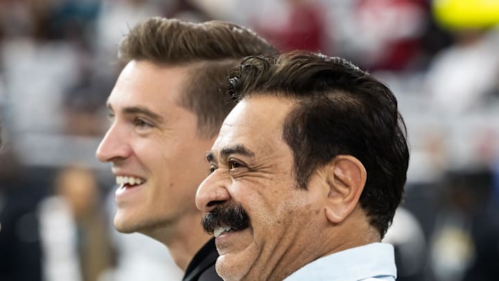 Nov 23, 2025; Glendale, Arizona, USA; Jacksonville Jaguars general manager James Gladstone (left) with owner Shad Khan against the Arizona Cardinals at State Farm Stadium. Mandatory Credit: Mark J. Rebilas-Imagn Images