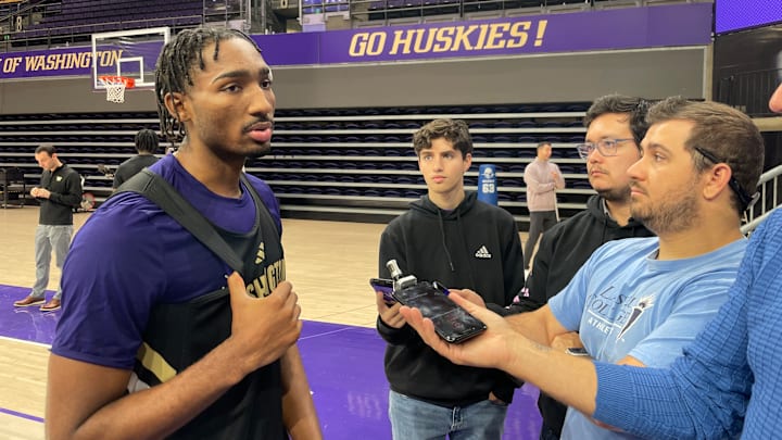 UW guard Mekhi Mason meets with media members after practice. 