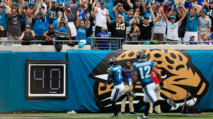 Jacksonville Jaguars fans erupt in the north end zone as wide receiver Brian Thomas Jr. (7) scores a touchdown during the second quarter of an NFL football matchup Sunday, Oct. 6, 2024 at EverBank Stadium in Jacksonville, Fla. The Jaguars edged the Colts on a field goal 37-34. [Corey Perrine/Florida Times-Union]