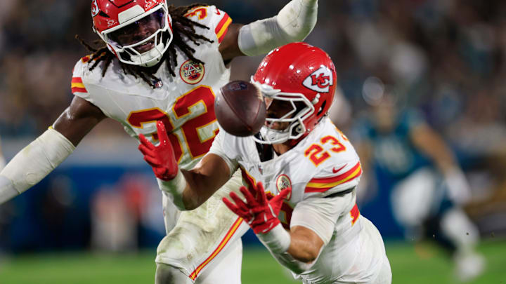 Kansas City Chiefs linebacker Nick Bolton (32) and linebacker Drue Tranquill (23) can’t intercept a bobbled pass during the second quarter of an NFL football matchup at EverBank Stadium, Monday, Oct. 6, 2025, in Jacksonville, Fla. [Corey Perrine/Florida Times-Union]
