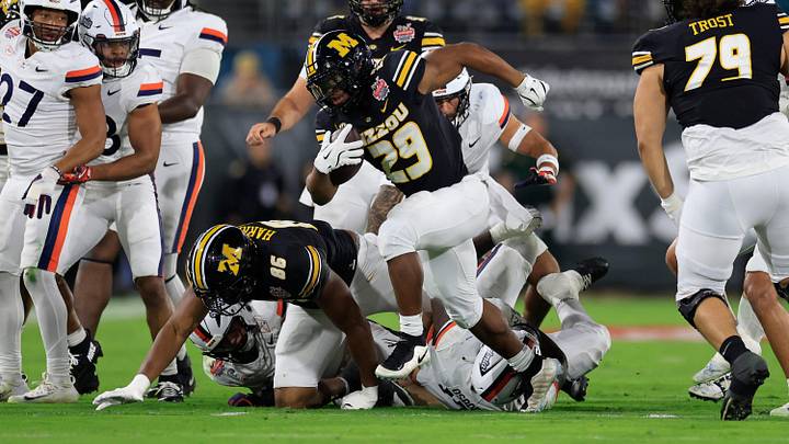 Missouri Tigers running back Ahmad Hardy (29) rushes for yards during the first quarter of the TaxSlayer Gator Bowl Missouri Tigers running back Ahmad Hardy (29) rushes for yards during the first quarter of the TaxSlayer Gator Bowl