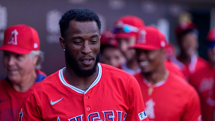 Feb 27, 2025; Mesa, Arizona, USA; Los Angeles Angels infielder Tim Anderson (77) celebrates with his team after hitting a home run in the first inning during a spring training game against the Chicago Cubs at Sloan Park. Mandatory Credit: Allan Henry-Imagn Images Feb 27, 2025; Mesa, Arizona, USA; Los Angeles Angels infielder Tim Anderson (77) celebrates with his team after hitting a home run in the first inning during a spring training game against the Chicago Cubs at Sloan Park. Mandatory Credit: Allan Henry-Imagn Images