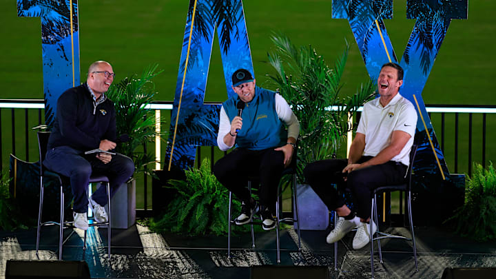 From left, emcee Jaguars senior reporter/editor J.P. Shadrick, Jacksonville Jaguars head coach Liam Coen, and Jacksonville Jaguars Hall of Famer Tony Boselli laugh on stage Thursday, Jan. 30, 2025 at EverBank Stadium in Jacksonville, Fla. Jaguars fans got a chance to see the new head coach speak and give a warm welcome at the stadium.