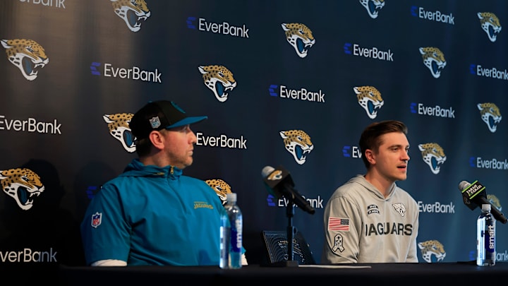 Jacksonville Jaguars head coach Liam Coen, left, listens as general manager James Gladstone answers questions from the media during a press conference at Miller Electric Center Tuesday, April 15, 2025 in Jacksonville, Fla. [Corey Perrine/Florida Times-Union]