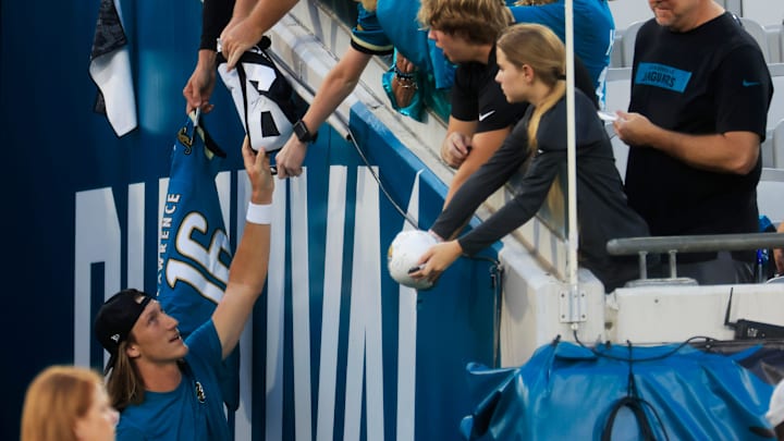 Jacksonville Jaguars quarterback Trevor Lawrence (16) signs autographs before an NFL football matchup at EverBank Stadium, Monday, Oct. 6, 2025, in Jacksonville, Fla. The Jacksonville Jaguars edged the Kansas City Chiefs 31-28. [Corey Perrine/Florida Times-Union]