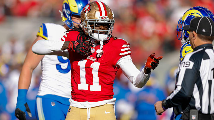 San Francisco 49ers wide receiver Brandon Aiyuk (11) celebrates after a play against the Los Angeles Rams during the first quarter at Levi's Stadium.