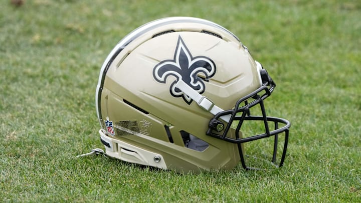 Aug 14, 2025; Carson, CA, USA; A New Orleans Saints helmet on the field during a joint practice against the Los Angeles Rams at the Dignity Health Sports Park. Mandatory Credit: Kirby Lee-Imagn Images Aug 14, 2025; Carson, CA, USA; A New Orleans Saints helmet on the field during a joint practice against the Los Angeles Rams at the Dignity Health Sports Park. Mandatory Credit: Kirby Lee-Imagn Images