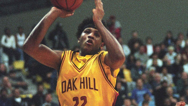 Feb 2, 2002; Long Beach, CA, USA; Oak Hill Academy Warriors forward Carmelo Anthony (22) shoots the ball against the Mater Dei Monarchs in the Nike Extravaganza at the Pyramid at Long Beach State. Mandatory Credit: Kirby Lee/Image of Sport-Imagn Images