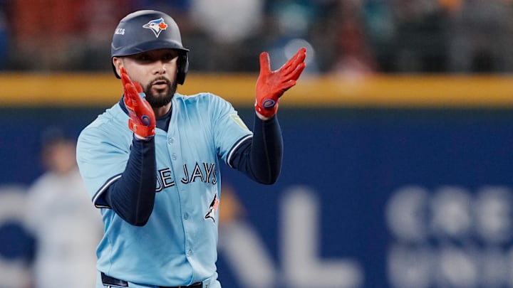 Oct 17, 2025; Seattle, Washington, USA; Toronto Blue Jays second baseman Isiah Kiner-Falefa (7) reacts after hitting a double against the Seattle Mariners in the third inning during game five of the ALCS round for the 2025 MLB playoffs at T-Mobile Park. Mandatory Credit: Stephen Brashear-Imagn Images
