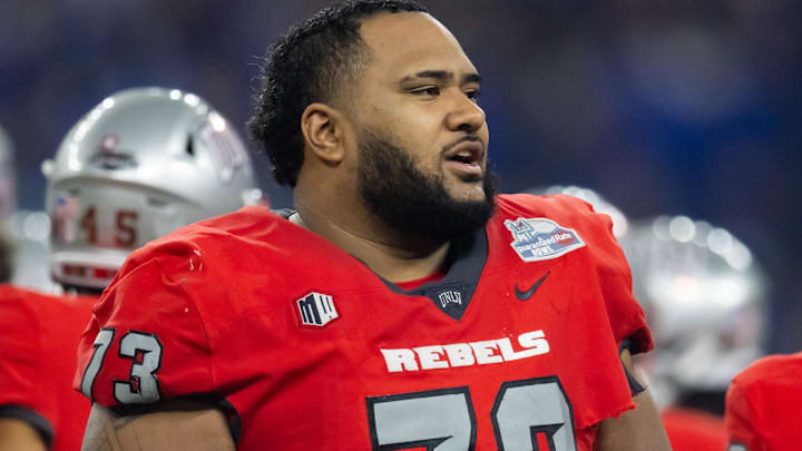 UNLV Rebels offensive lineman Alani Makihele (73) against the Kansas Jayhawks in the Guaranteed Rate Bowl at Chase Field. Mandatory Credit: Mark J. Rebilas-USA TODAY Sports UNLV Rebels offensive lineman Alani Makihele (73) against the Kansas Jayhawks in the Guaranteed Rate Bowl at Chase Field. Mandatory Credit: Mark J. Rebilas-USA TODAY Sports