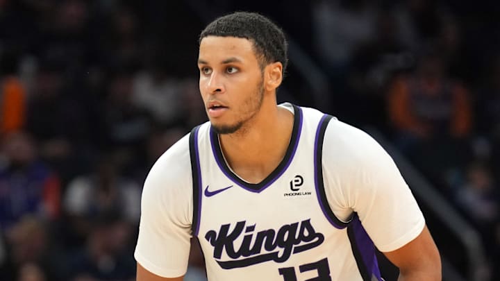 Jan 2, 2026; Phoenix, Arizona, USA; Sacramento Kings forward Keegan Murray (13) controls the ball against the Phoenix Suns during the second half at Mortgage Matchup Center.