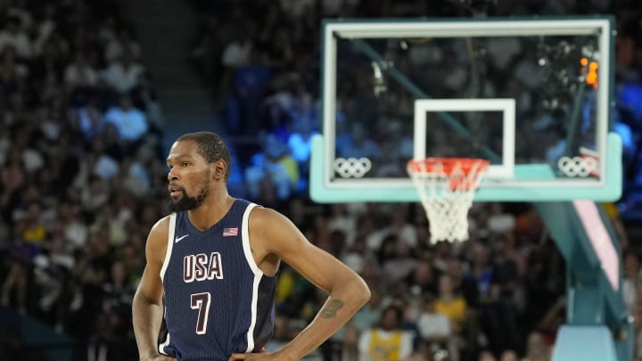 Aug 6, 2024; Paris, France; United States guard Kevin Durant (7) looks on in the first half against Brazil in a men’s basketball quarterfinal game during the Paris 2024 Olympic Summer Games at Accor Arena. Mandatory Credit: Kyle Terada-USA TODAY Sports Aug 6, 2024; Paris, France; United States guard Kevin Durant (7) looks on in the first half against Brazil in a men’s basketball quarterfinal game during the Paris 2024 Olympic Summer Games at Accor Arena. Mandatory Credit: Kyle Terada-USA TODAY Sports